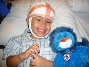 Ryan-Otchis-and-his-Ryan's-Lion-Epilepsy-Awareness Ryan Otchis during his EEG with his Ryan's Lion